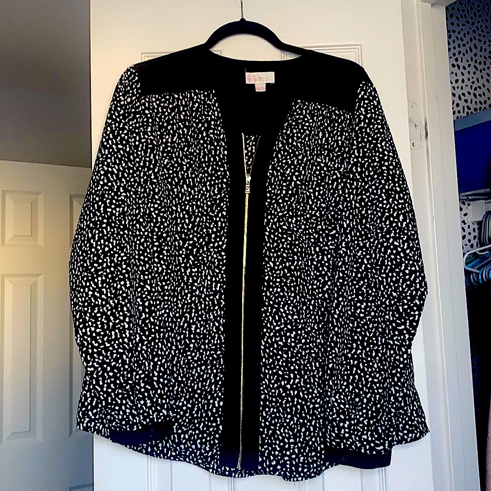 Black and white full zip front top
